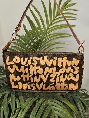 Louis Vuitton Limited Edition Graffiti LV Monogram Canvas Pouchette in 🧡